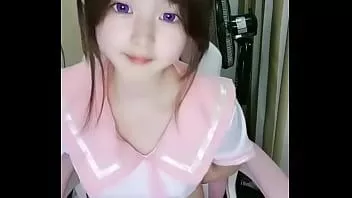 Play A cute girl performs in front of the camera